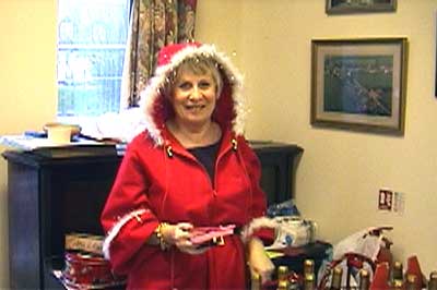 The Wine Raffle in the capable hands of Mrs Claus (Janet Dobson) 