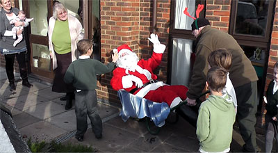 Father Christmas arrived by .................. wheelbarrow!