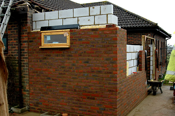the brickwork well under way 